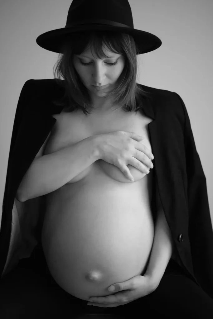 a pregnant woman with a hat